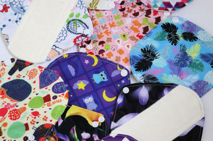 photo of reusable panty liners in a variety of colorful fabrics