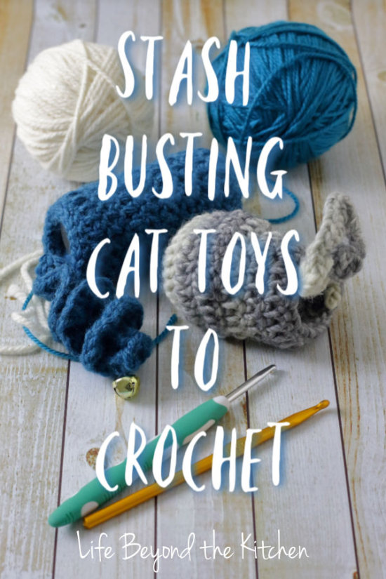 balls of yarn, crochet hooks and crocheted cat toys