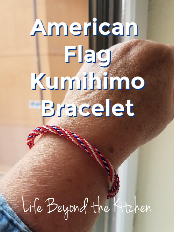 large image with American flag kumihimo bracelet and text