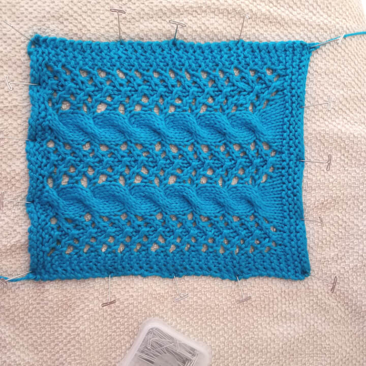 blocking the body of the knit clutch into a square shape