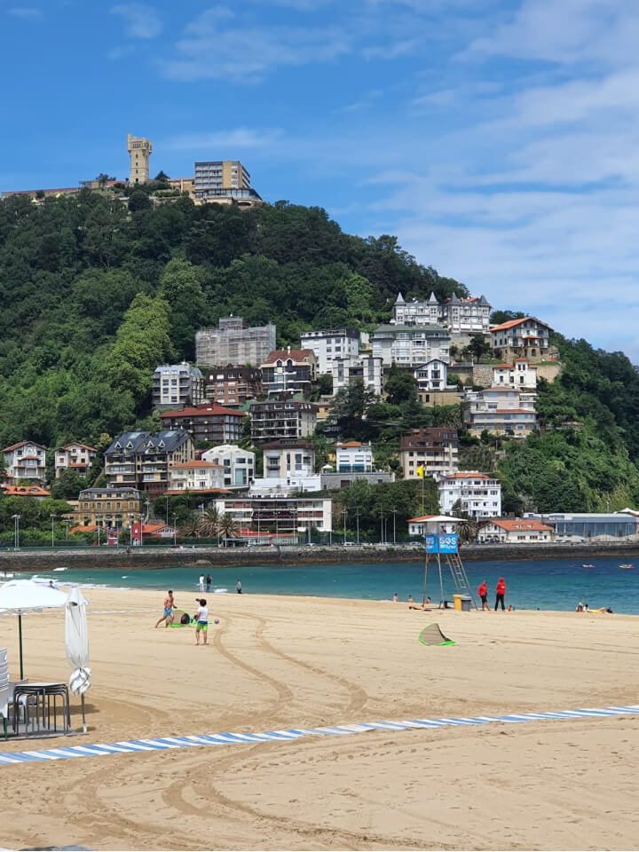 photo of the houses on the side of Mt Igueldo taken from the promenade in San Sebastian