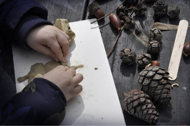 child using clay