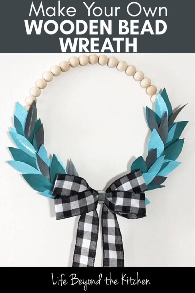 large image showing a wooden bead wreath with text Make Your Own Wooden Bead Wreath