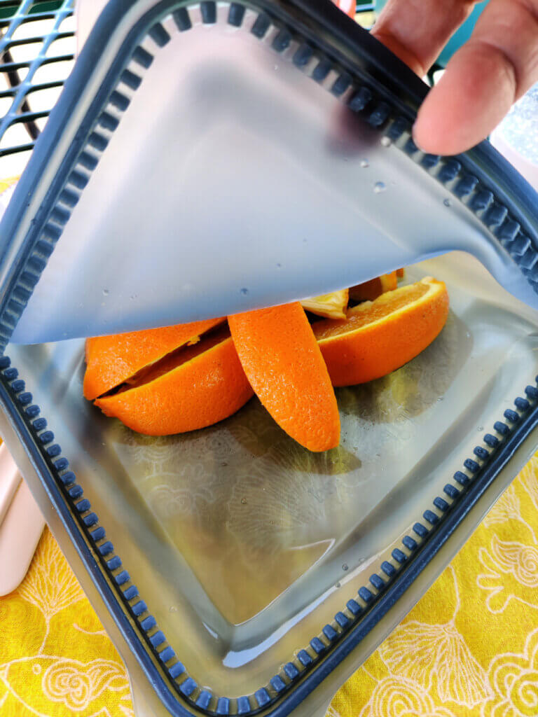 orange slices in a reusable silicon bag
