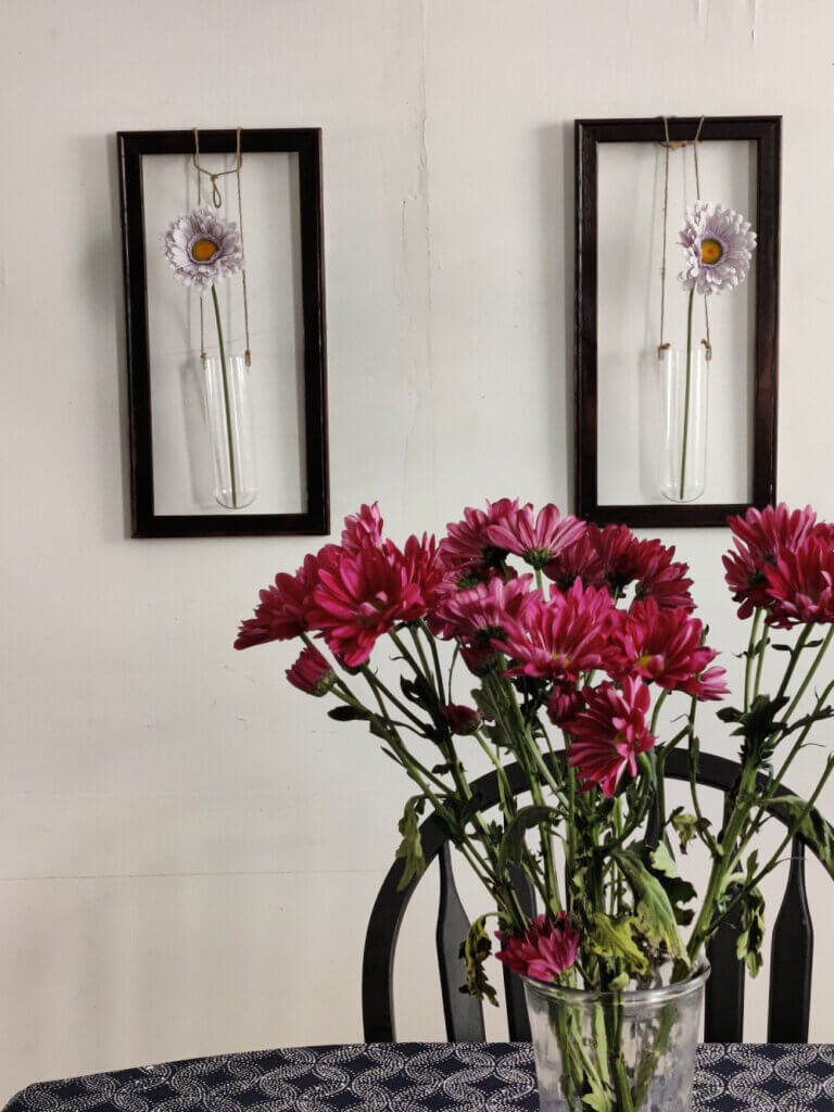 framed vases with flowers